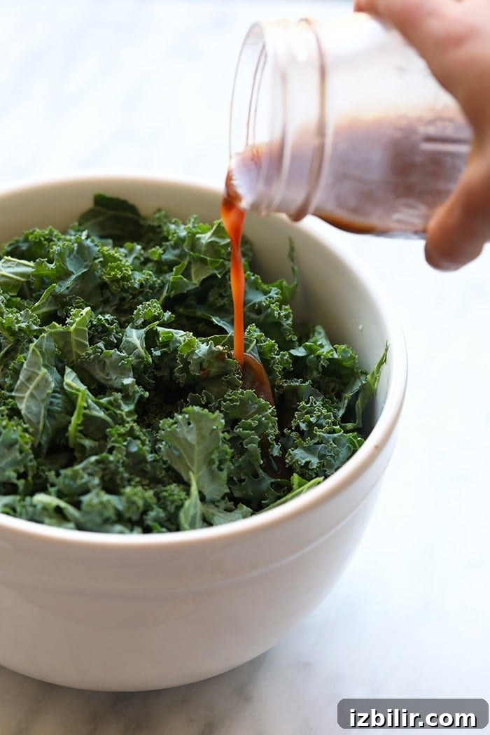 Pomegranate Vinaigrette on massaged kale salad dressing on kale