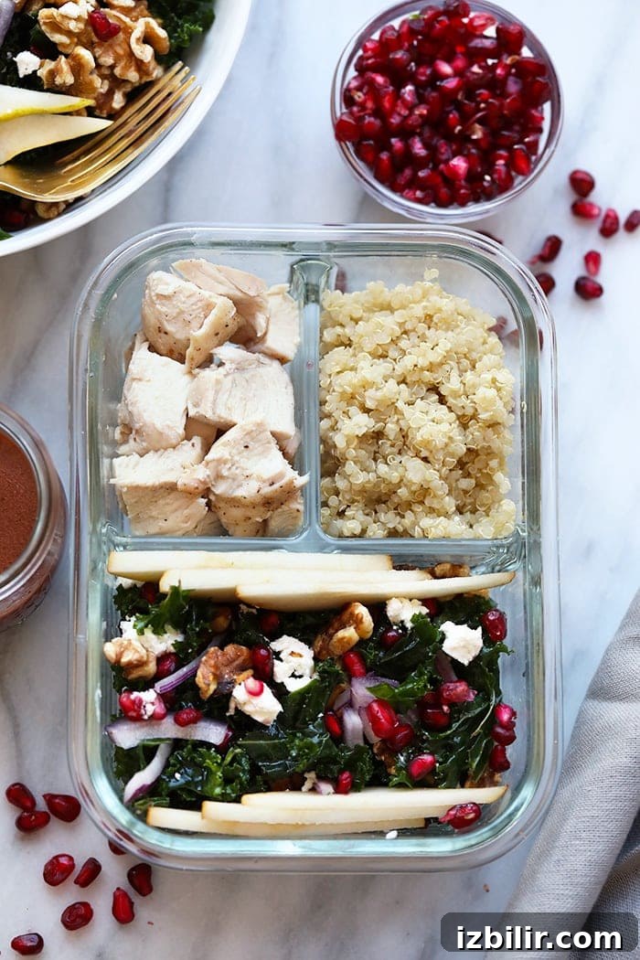 Kale, Pomegranate and Pear Salad 2 Not only is this kale salad colorful, but it's flavorful too! This Pomegranate and Pear Kale Salad is made with a homemade POM Vinaigrette and topped with fresh pomegranate arils, pear slices, walnuts, and goat cheese. YUM.