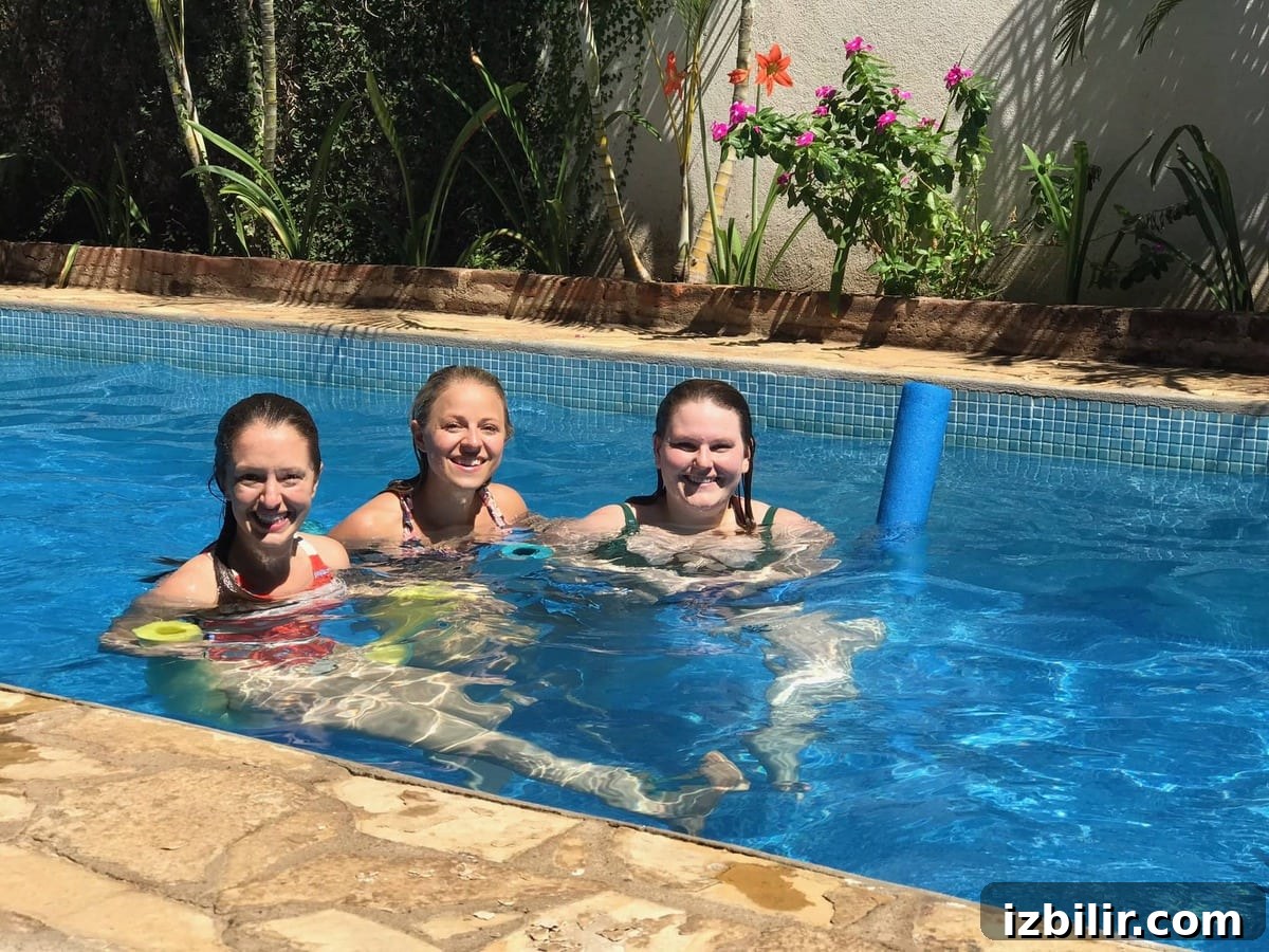 Hotel con Corazon is a botique hotel in Granada, Nicaragua! Travel to Granada for a vacation. Girls in a pool.