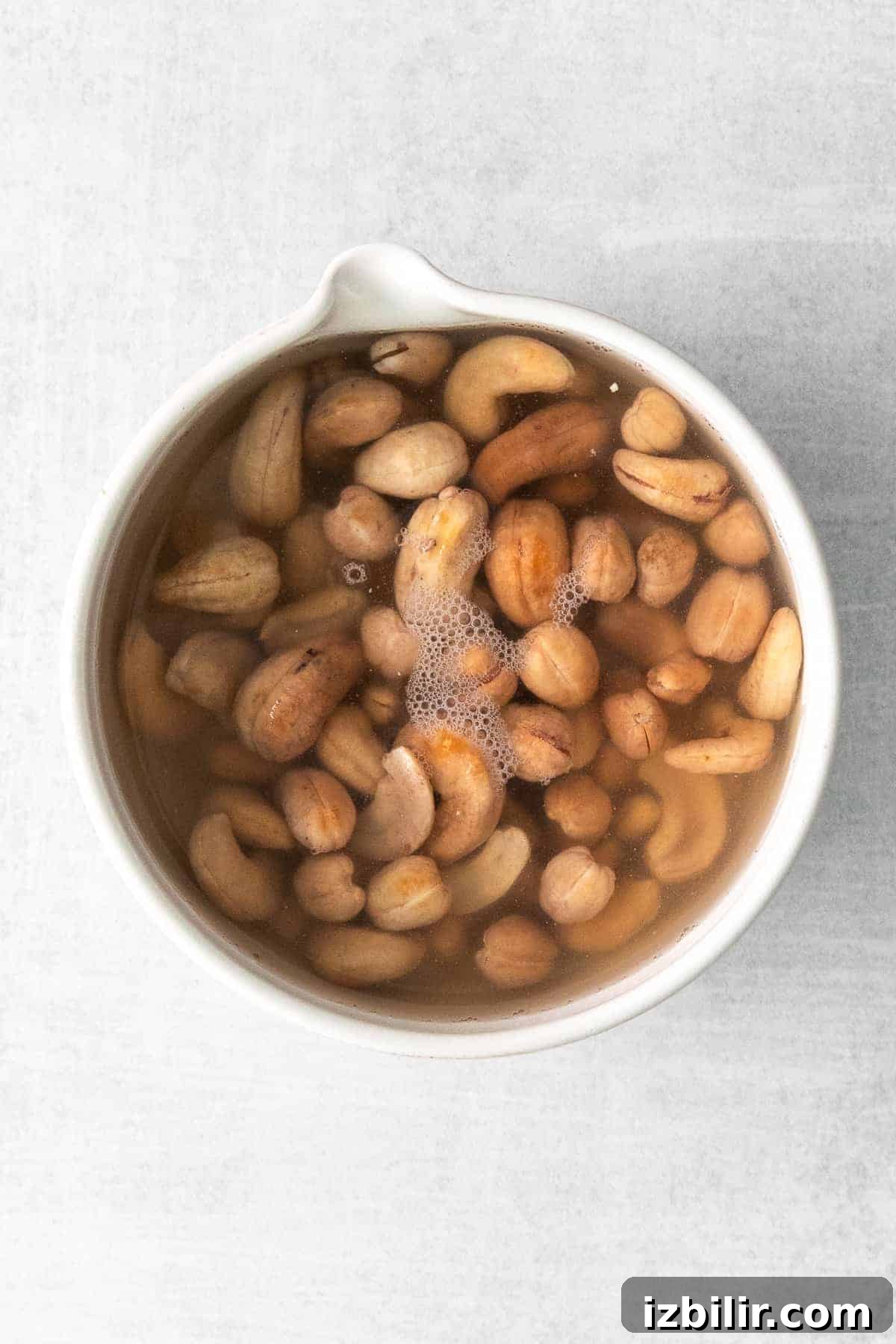 raw cashews soaking in water