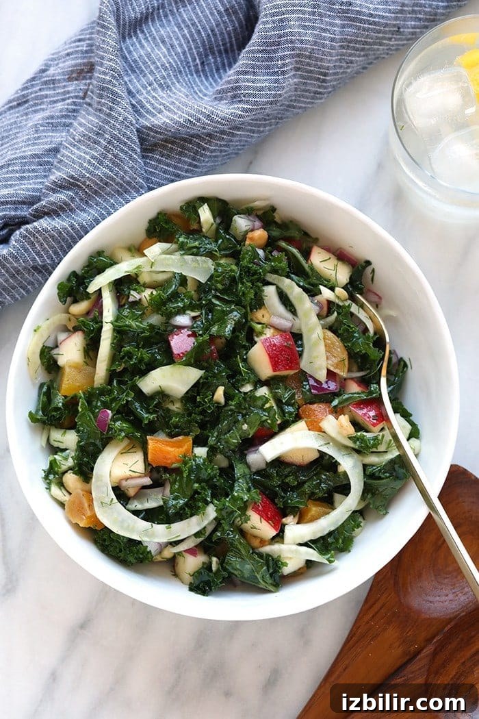 Massaged kale and fennel salad ready to serve Finished massaged kale salad in a mixing bowl.