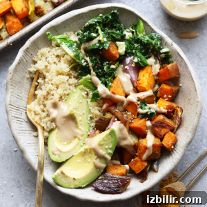 Sweet Potato Vegan Buddha Bowl Recipe for Plant-Based Lunch 2 Buddha bowl with carrots, sweet potatoes, and avocado.