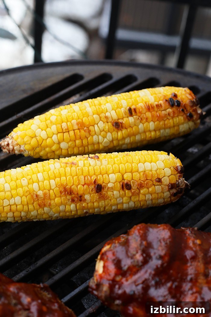 Start your grill for these BBQ chicken bowls Corn and BBQ chicken on the grill
