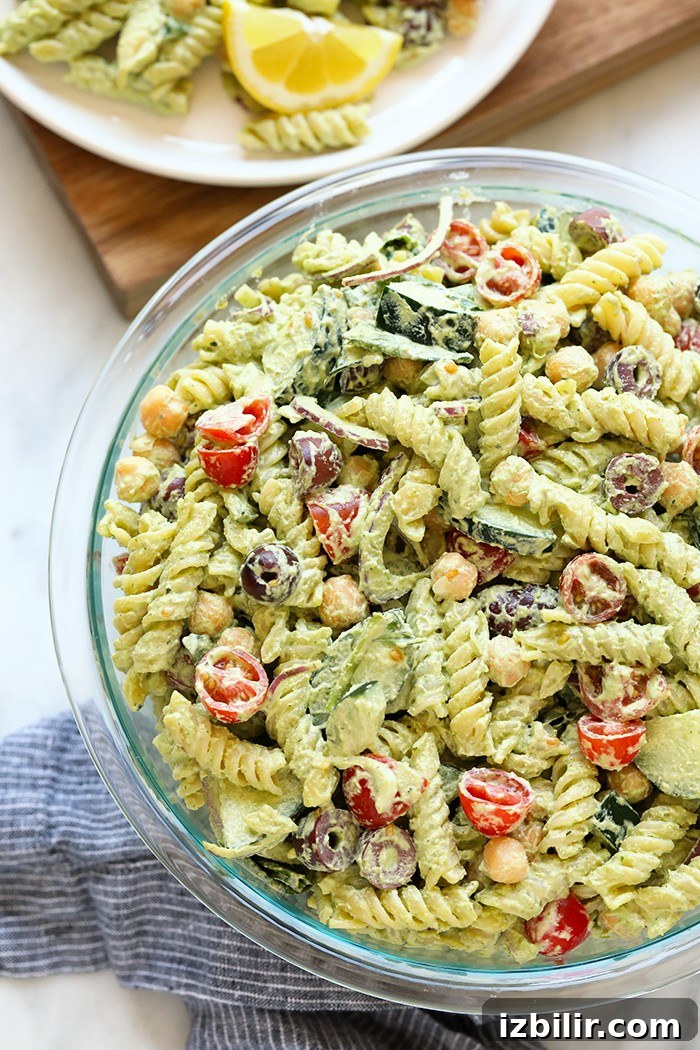 Creamy Greek Pasta Salad with Cashew Vegan Pesto. Pasta salad in a bowl.