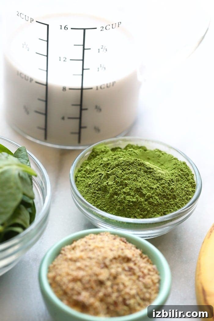 This matcha smoothie recipe is easy to make and a healthy breakfast for you and the family! Matcha is a great coffee-alternative that tastes great, especially when blended with bananas! ingredients for the matcha smootie