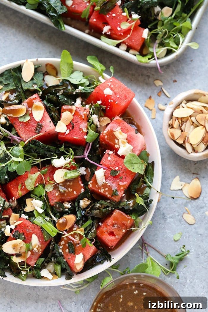 Grilled kale and watermelon salad in a bowl