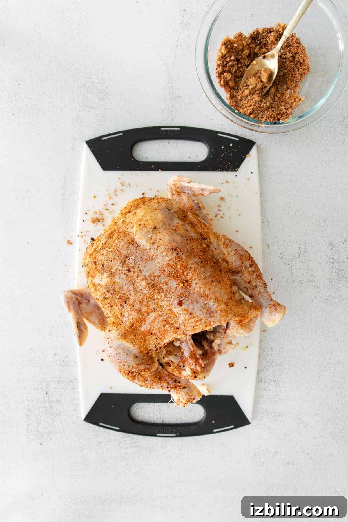Juicy Beer Can Chicken Recipe with Crispy Skin 6 raw chicken on cutting board.