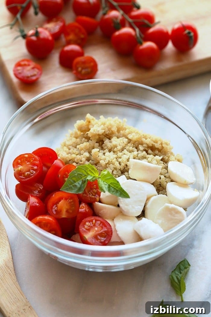 fresh caprese quinoa salad ingredients in a bowl