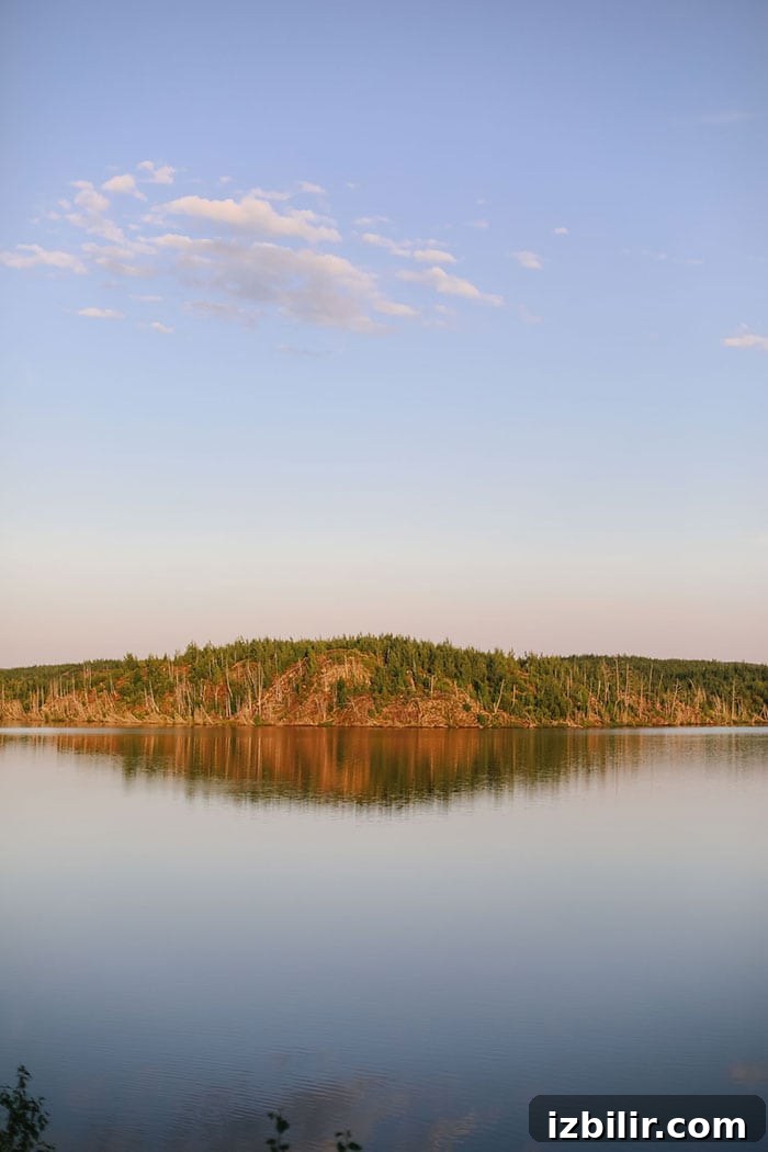 Looking for an active 4-day itinerary for your Boundary Waters trip? This BWCA itinerary offers a base camp and active day trip paddles, fishing recommendations, and delicious healthy camp food recipes. Don't leave home without this itinerary next time you find yourself headed to the BWCA! Jasper Lake in the BWCA at sunset