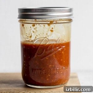 Instant Pot Beef and Broccoli Recipe: Tender Asian-Style 2 stir fry sauce in a mason jar