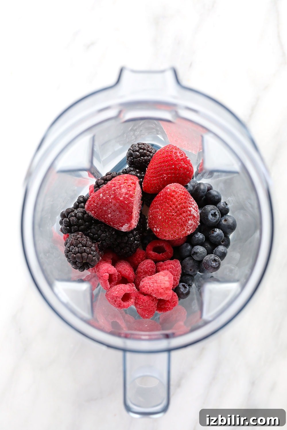 frozen berries in a blender