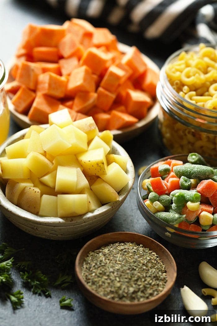 Ingredients for hamburger soup in small bowls