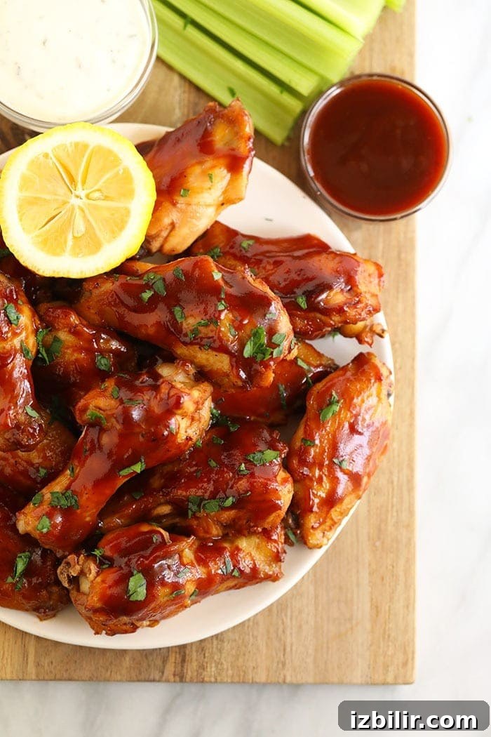 Served BBQ crockpot chicken wings bbq crockpot wings on a plate