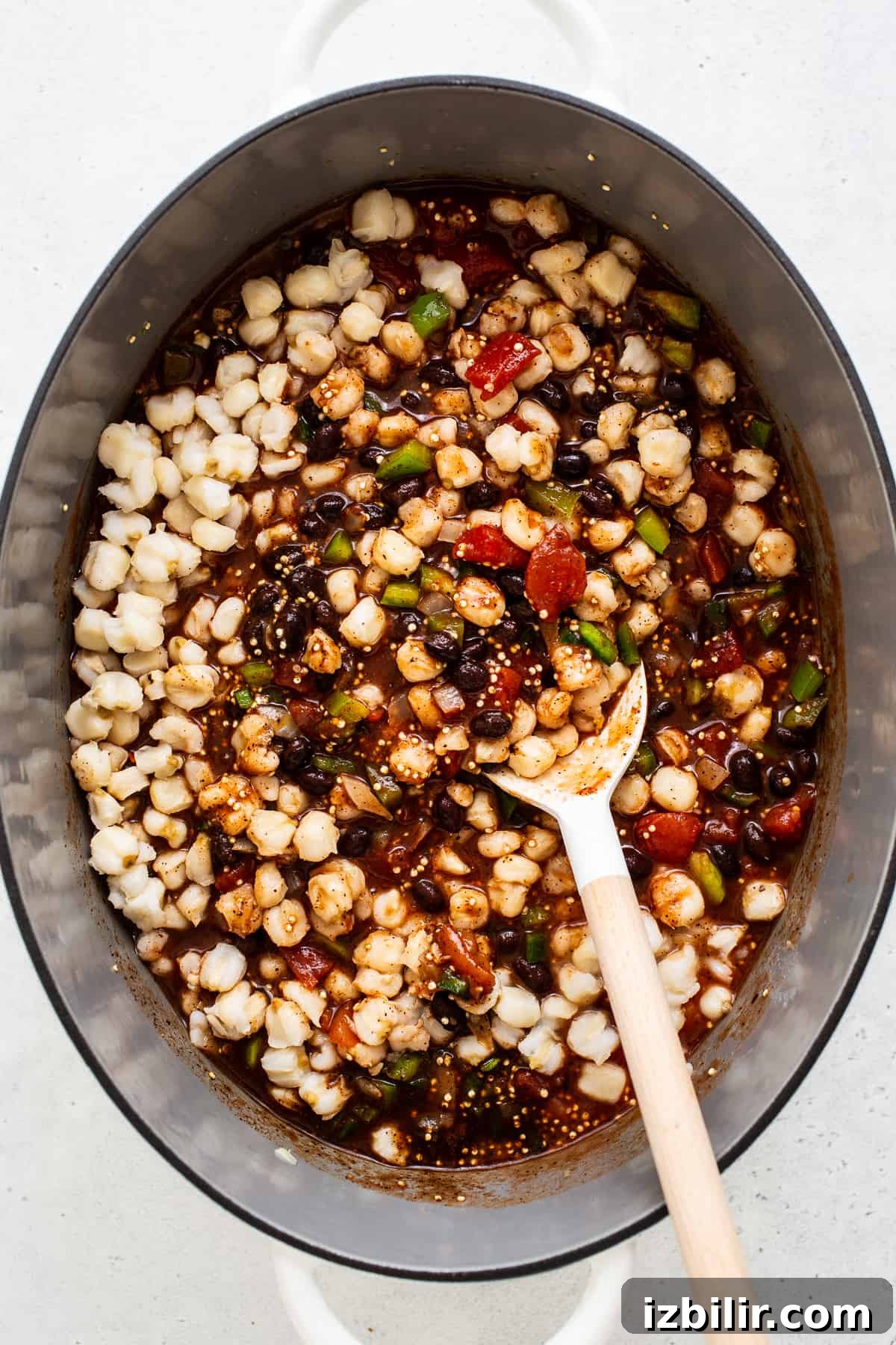 black bean quinoa chili ingredients in Dutch oven.