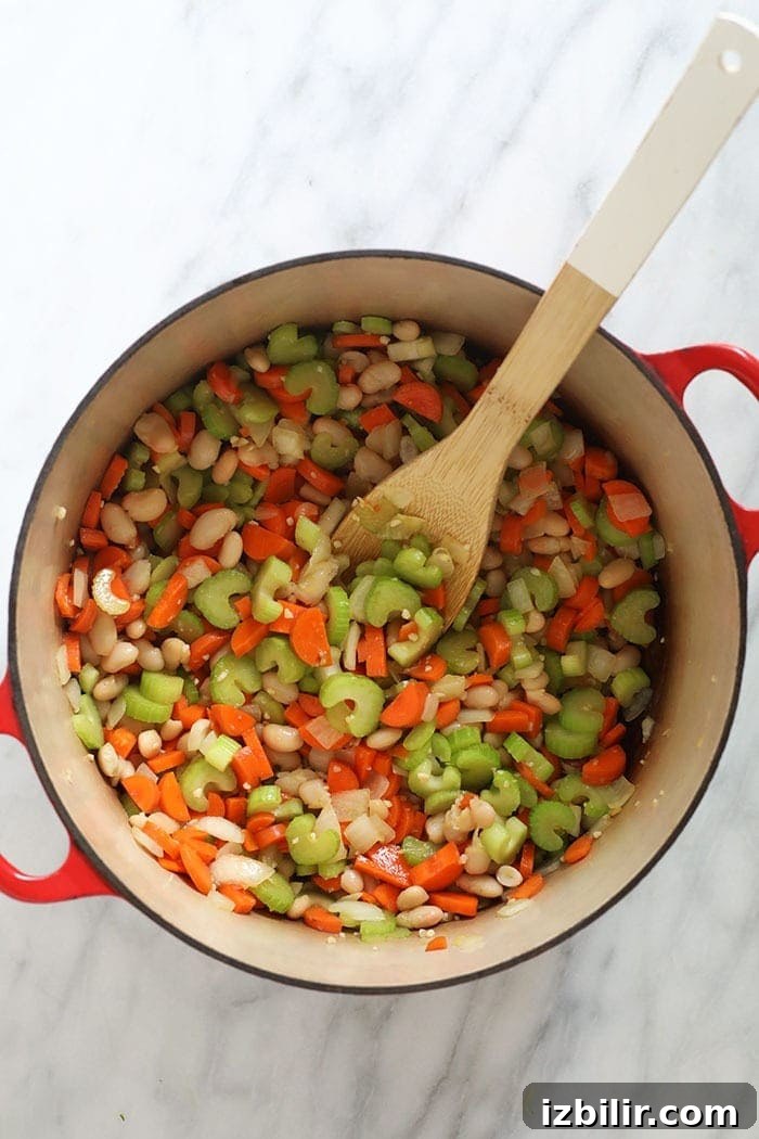Simmering Chicken Quinoa Soup chicken quinoa soup in a pot