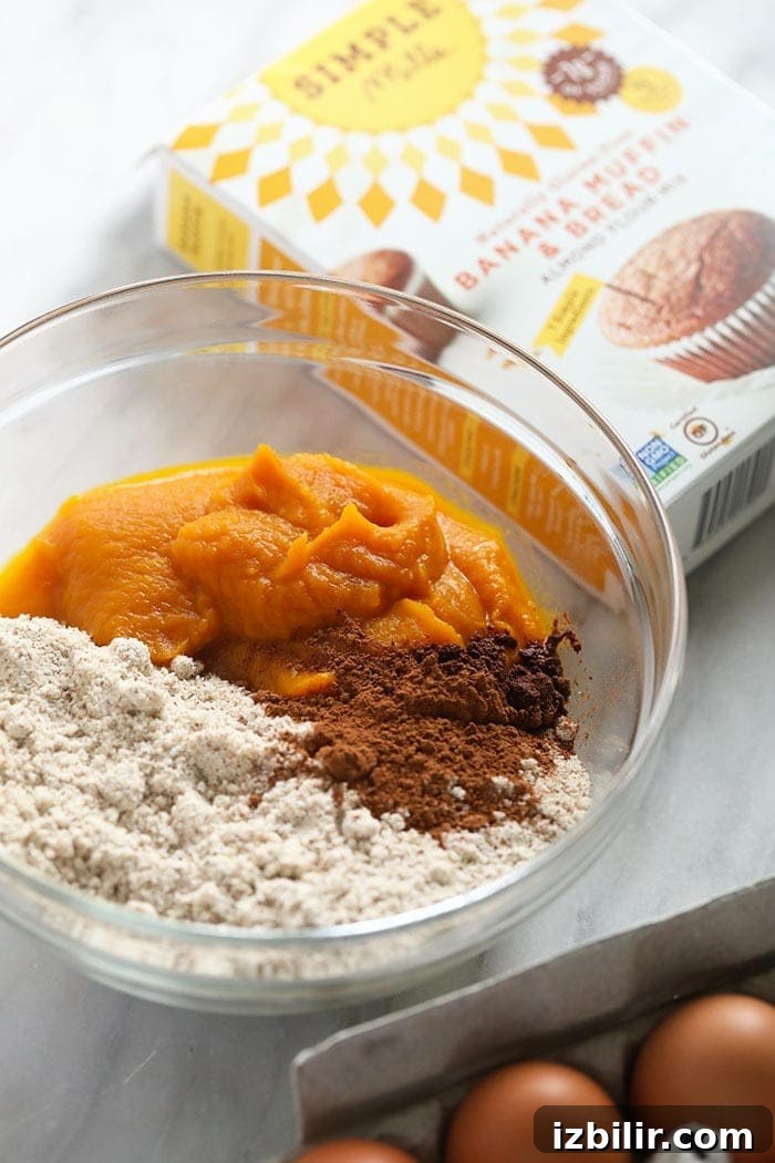 Gluten free pumpkin muffin ingredients in a bowl