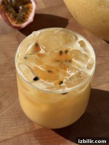 Creamy passionfruit agua fresca in a glass