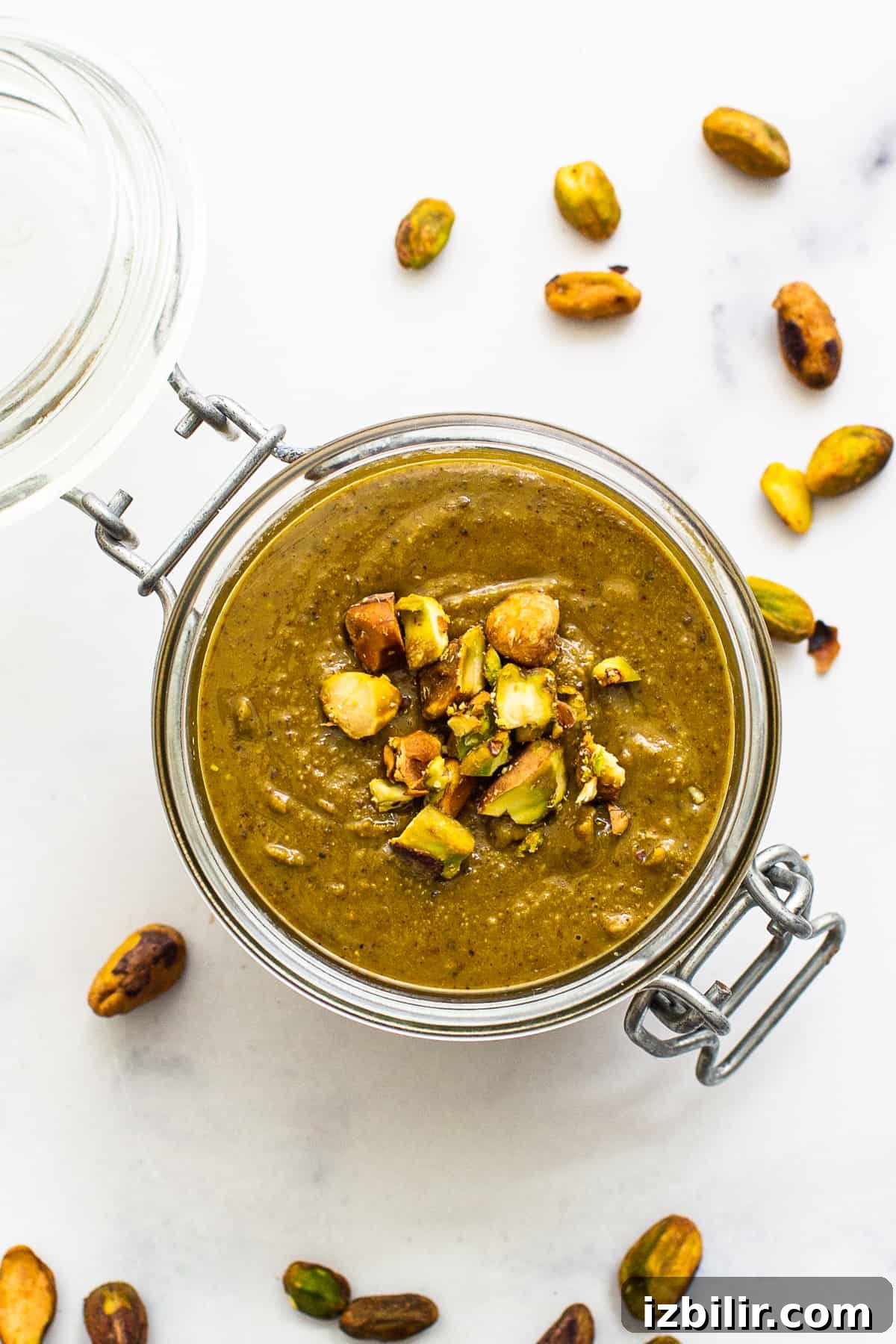 Homemade Maple Pistachio Butter with Sea Salt 2 Homemade pistachio butter in a glass dish.