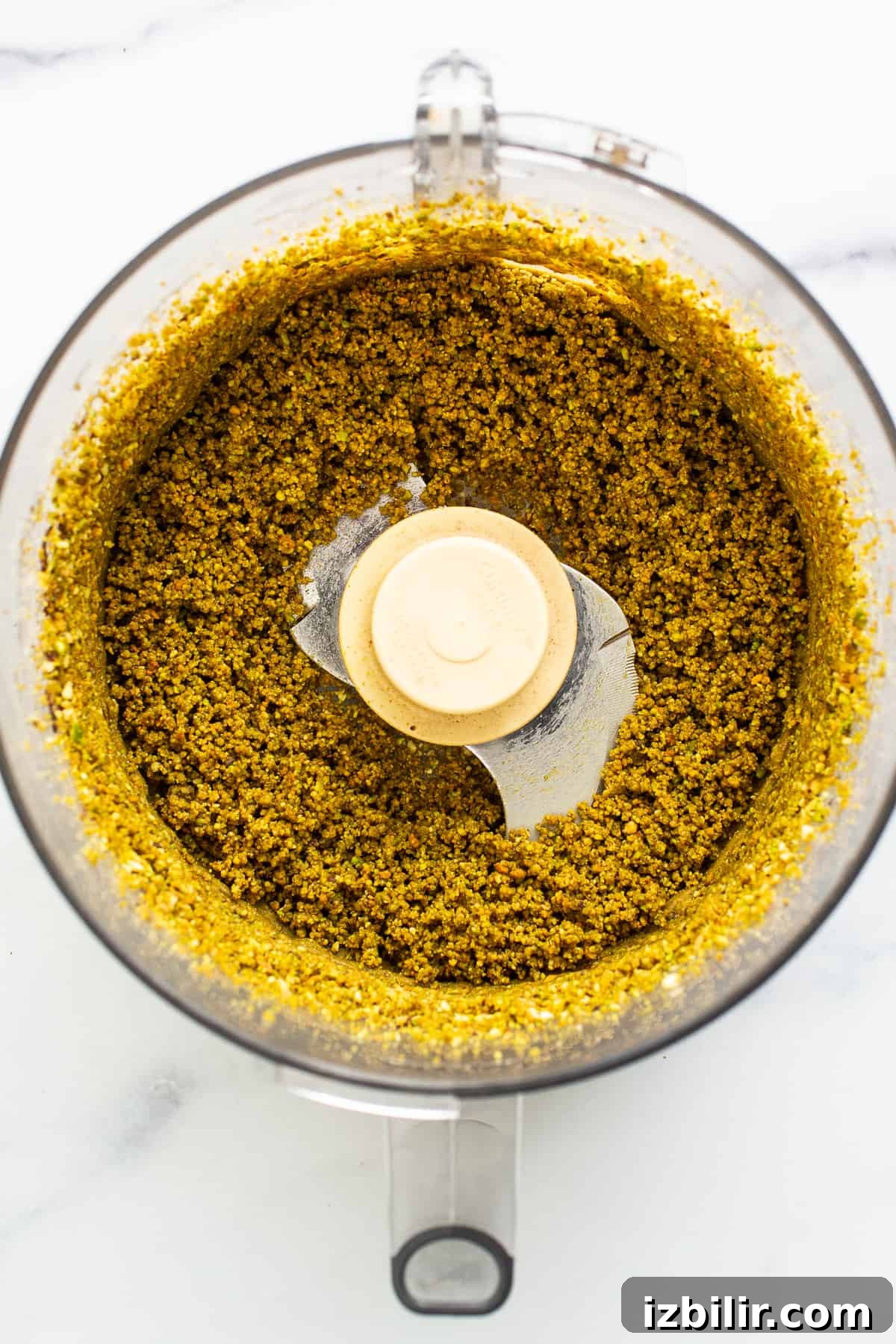 Homemade Maple Pistachio Butter with Sea Salt 5 Processed pistachios in a food processor.