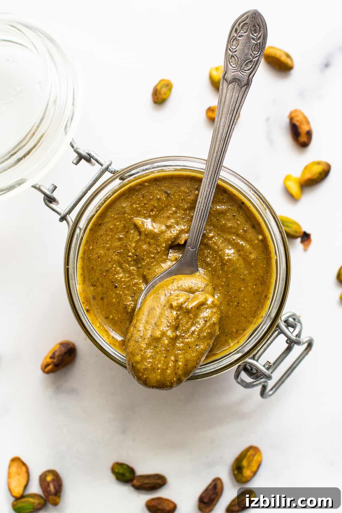 Homemade Maple Pistachio Butter with Sea Salt 7 Pistachio butter in a glass container.