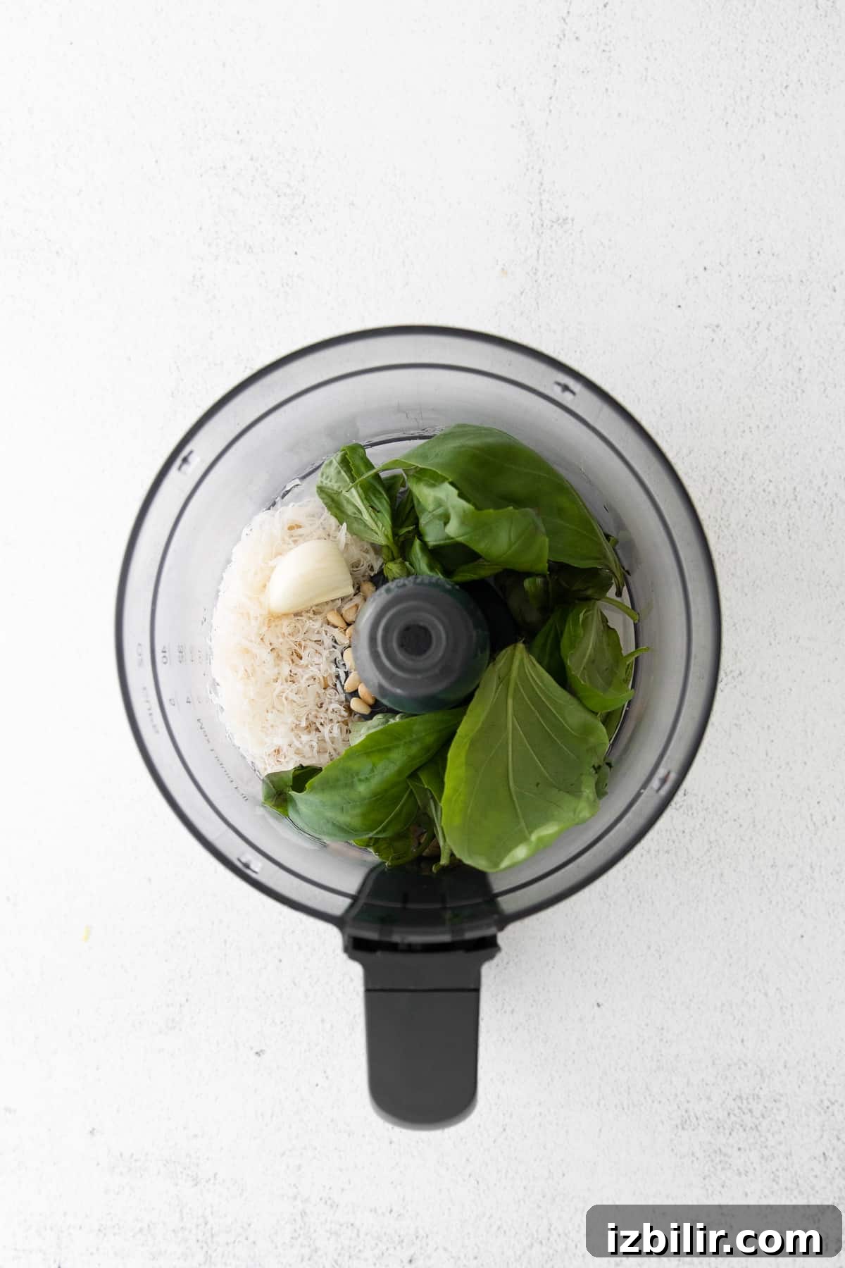 This basil pesto comes together in less than 5 minutes in a food processor. basil in food processor