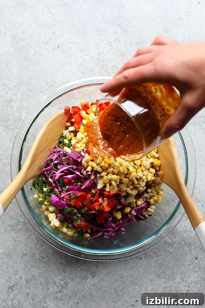 Fresh Summer Corn Salad Recipe with Tomatoes and Basil 4 Corn salad ingredients in a bowl.