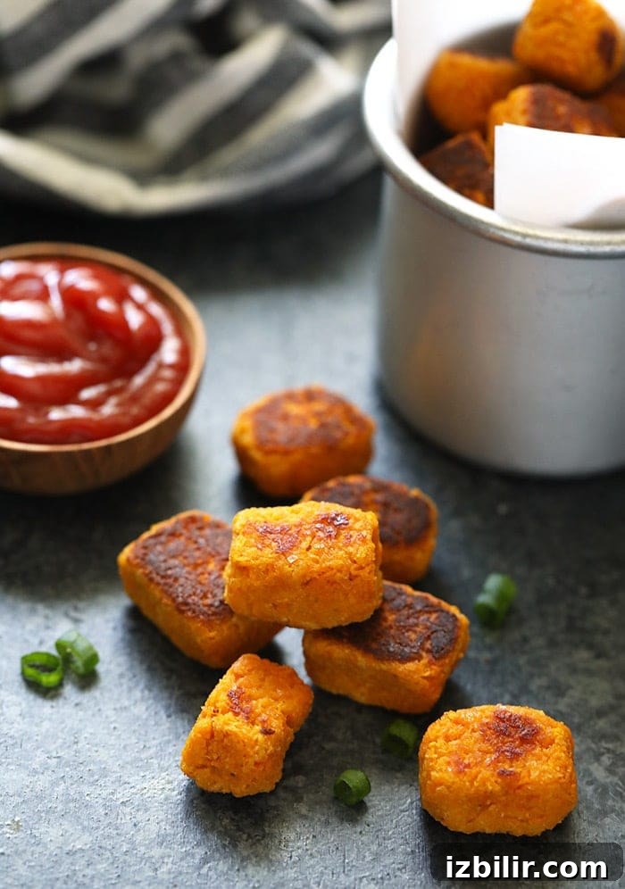 Make these sweet potato tater tots for a healthy and delicious side dish Stacked sweet potato tater tots.