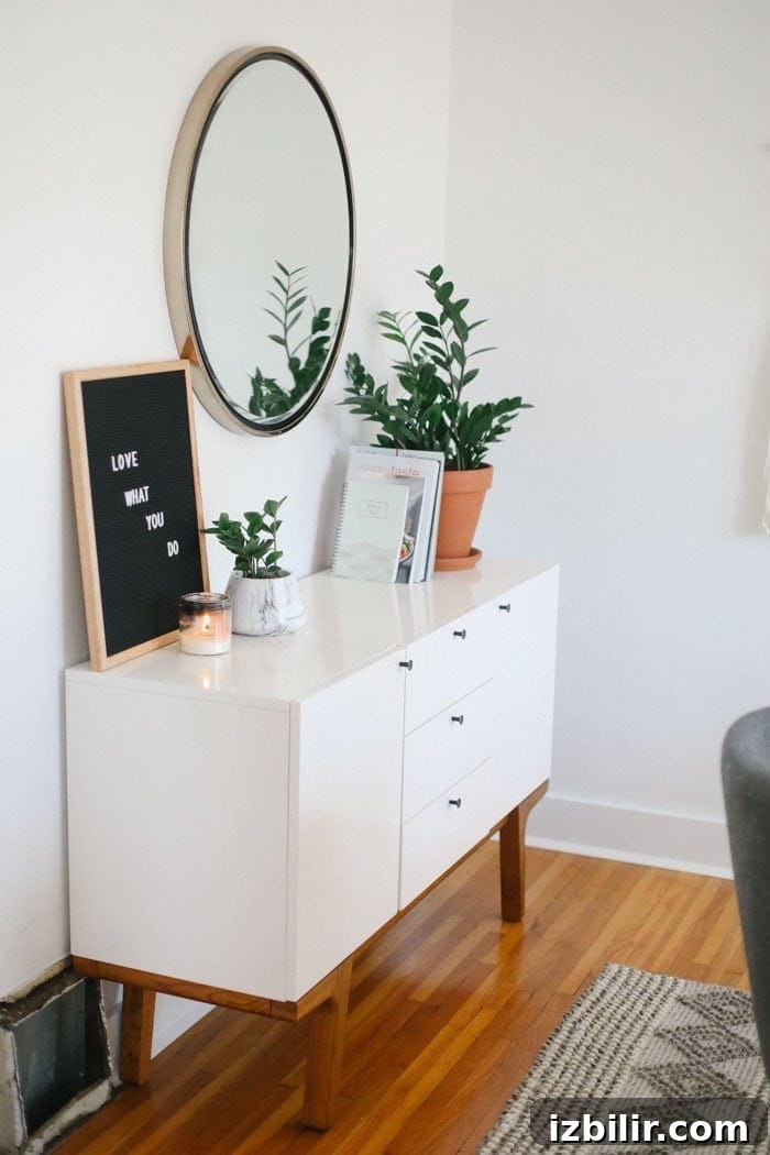 Modern buffet with circle mirror