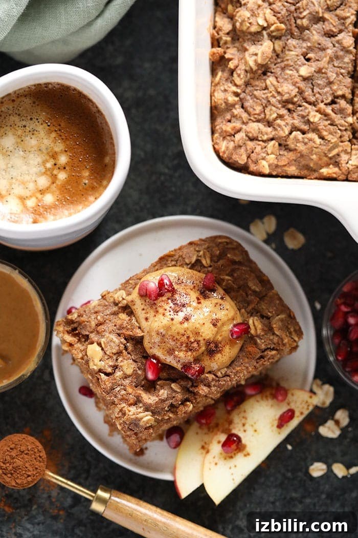 Apple cinnamon baked oatmeal ready to serve Apple cinnamon baked oatmeal on a plate