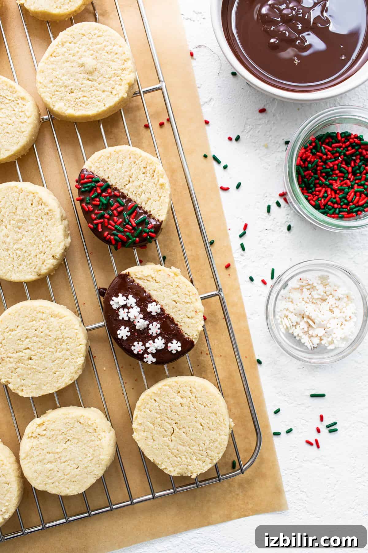 Almond Flour Shortbread Cookies Recipe 6 Cookies on a cooling rack with sprinkles.