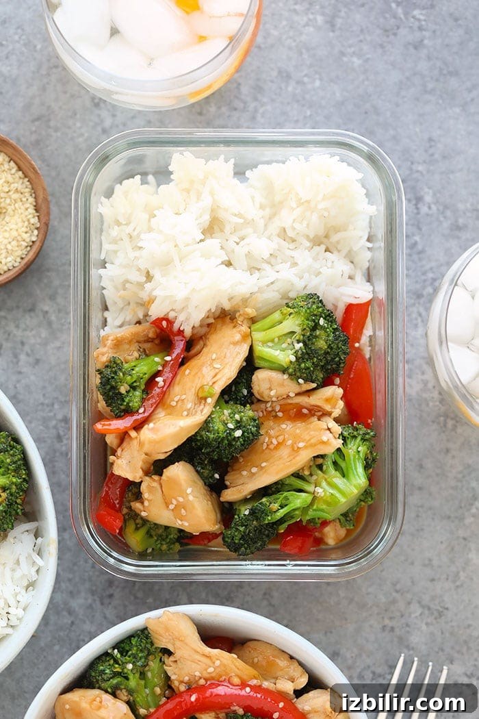 Chicken and broccoli stir fry in a meal prep container.