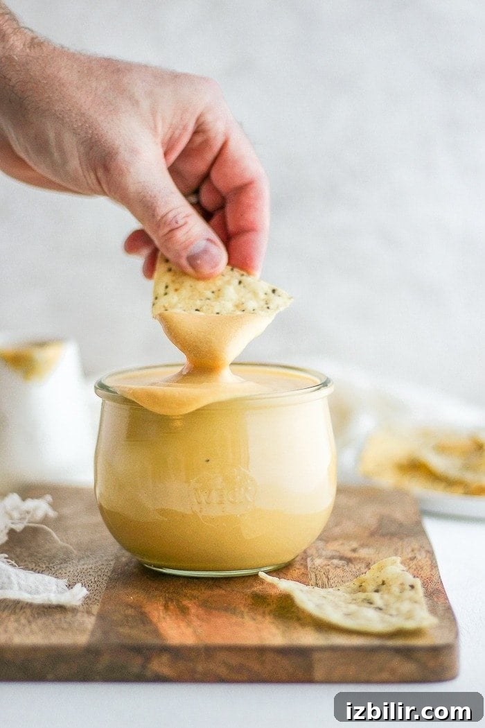 Everyone loves a good creamy cheese sauce. This vegan cheese sauce tastes delicious on everything. Vegan Cheese Sauce