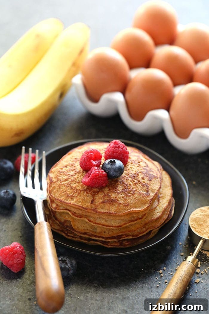 High-Protein Peanut Flour Pancakes 4 A stack of pancakes