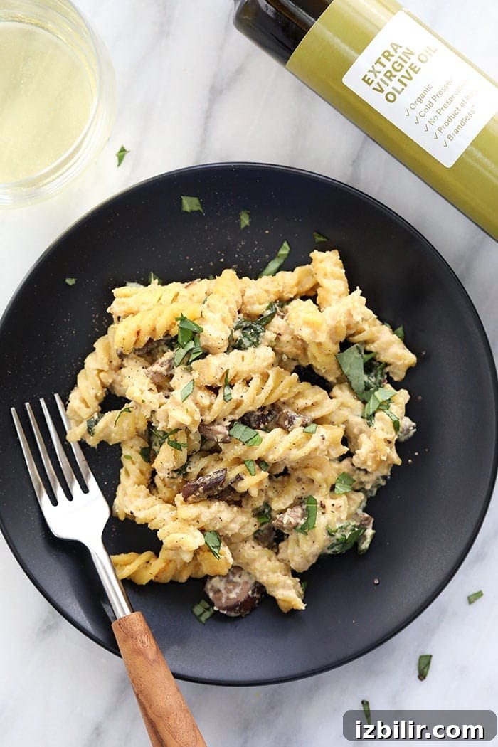 vegan pasta with white wine pasta sauce on a plate