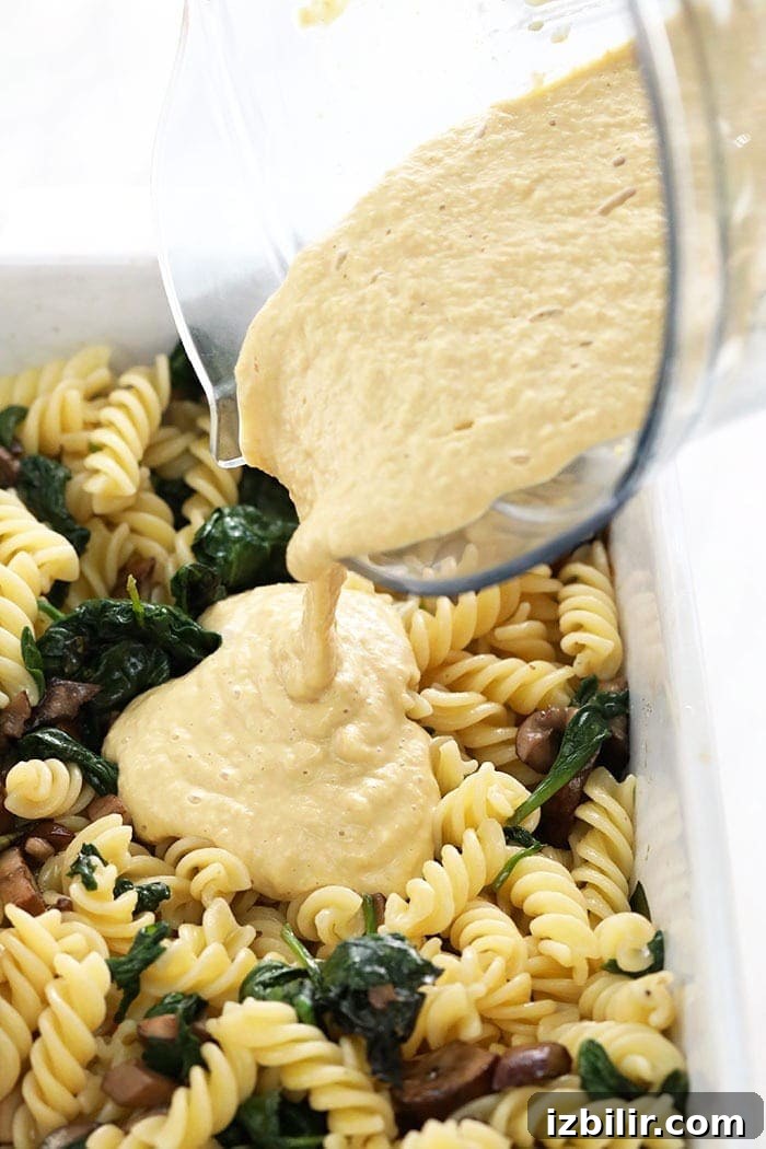 vegan pasta with white wine cheese sauce in a casserole dish