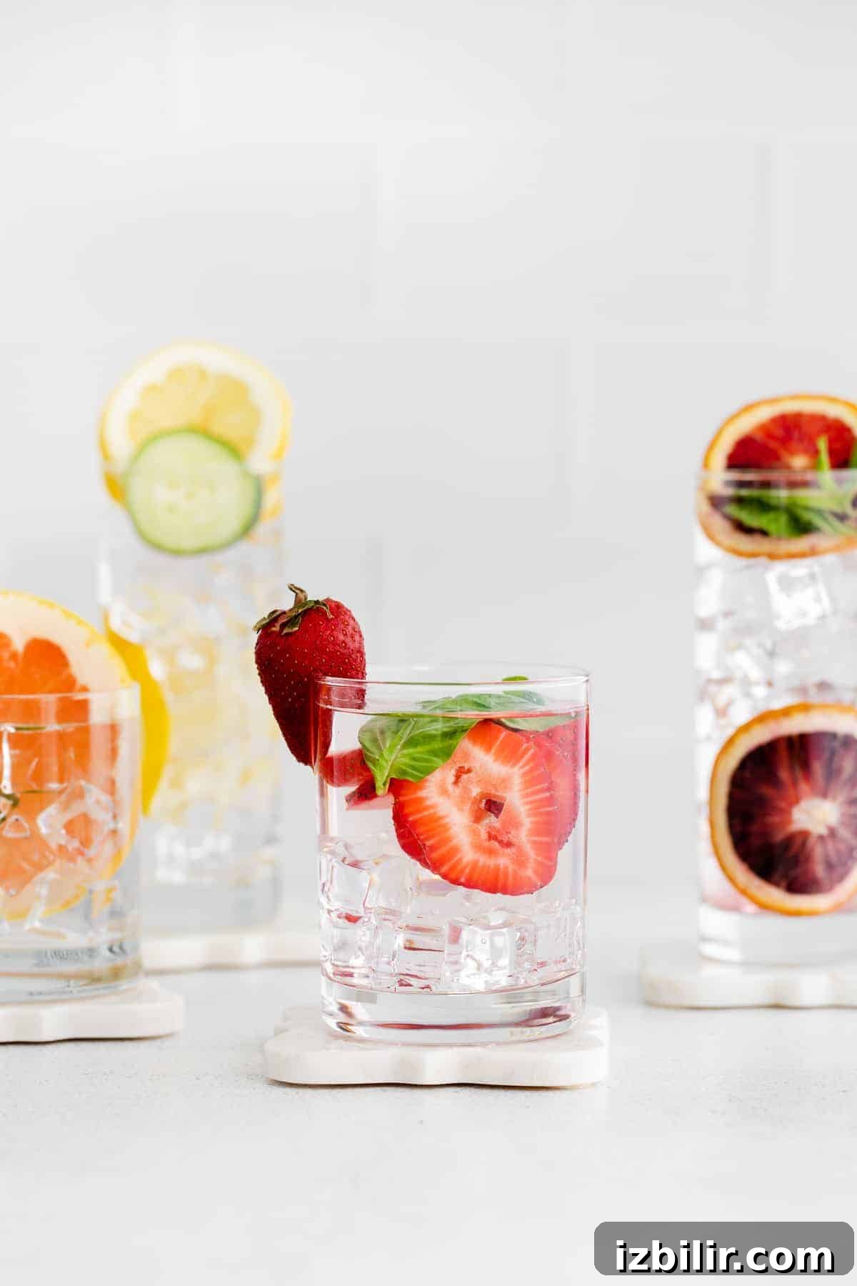 Refreshing Fruit-Infused Water Recipes to Try 2 Fruit infused water in glasses.