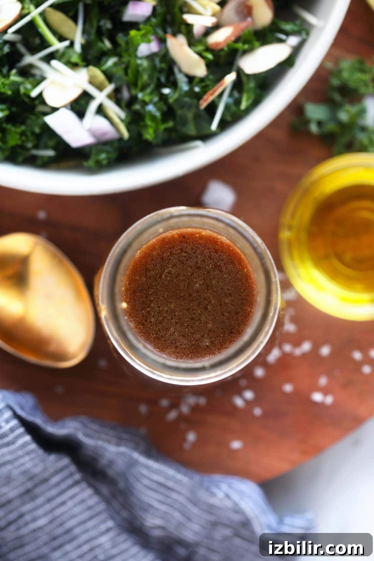 balsamic vinaigrette next to spoon