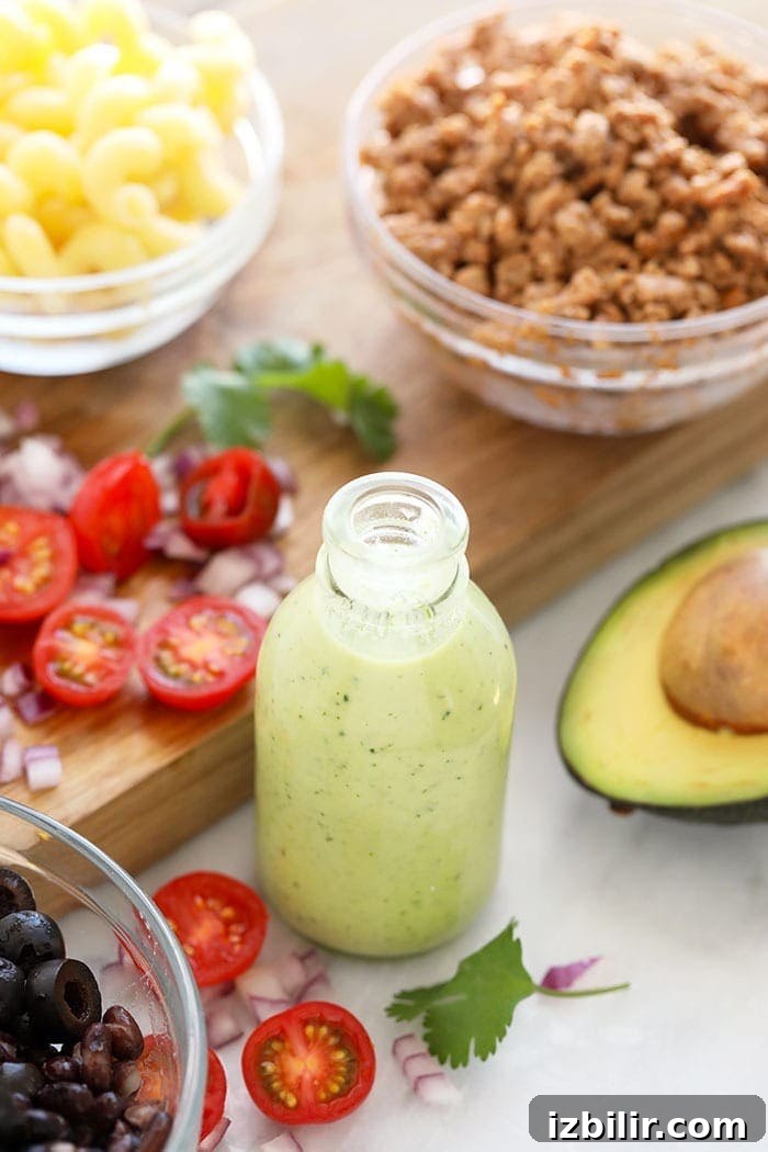 A jar of avocado cilantro lime dressing
