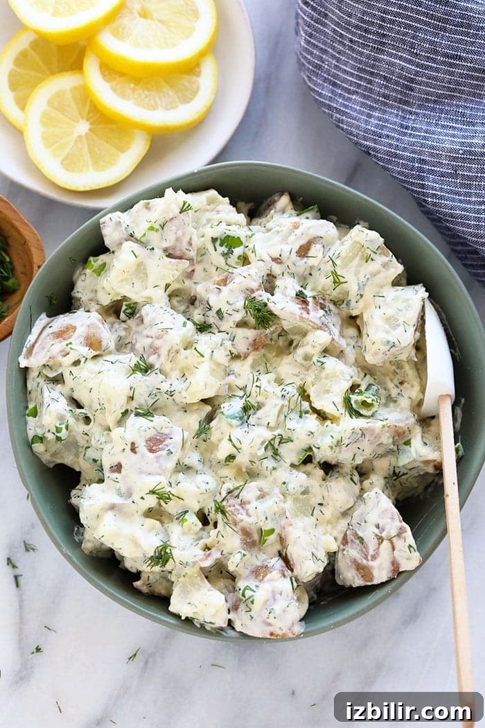 This vegan potato salad is light, bright, and delicious! Not only is this potato salad the perfect summer side, but it's also so easy to make. A bowl of vegan potato salad
