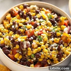 Mexican black bean corn salad with tortilla chips.