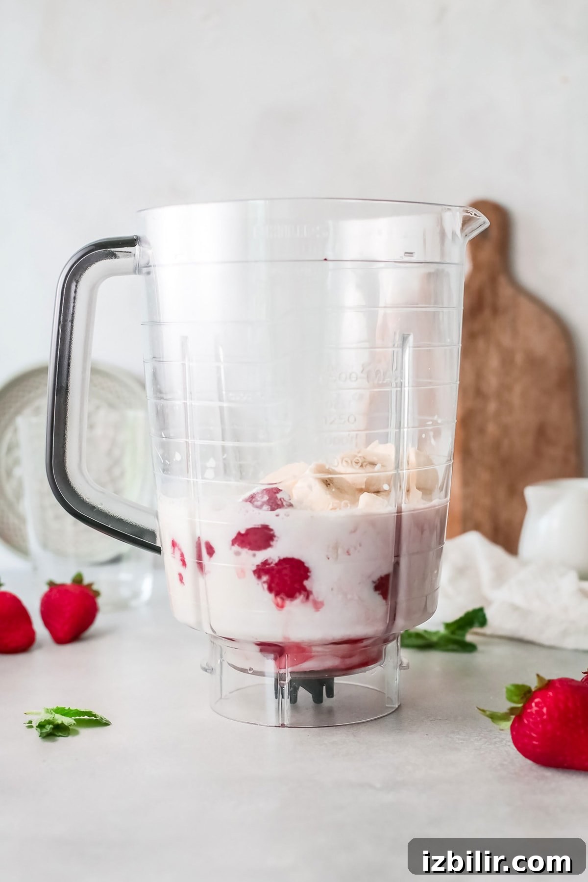 Strawberry and banana smoothie ready to blend strawberry and banana smoothie in blender
