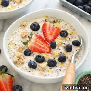 Creamy Lemon Cheesecake Overnight Oats Recipe 5 a jar of overnight oats with berries