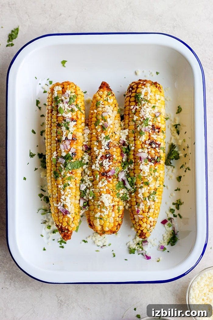 grilled Mexican corn in tin.