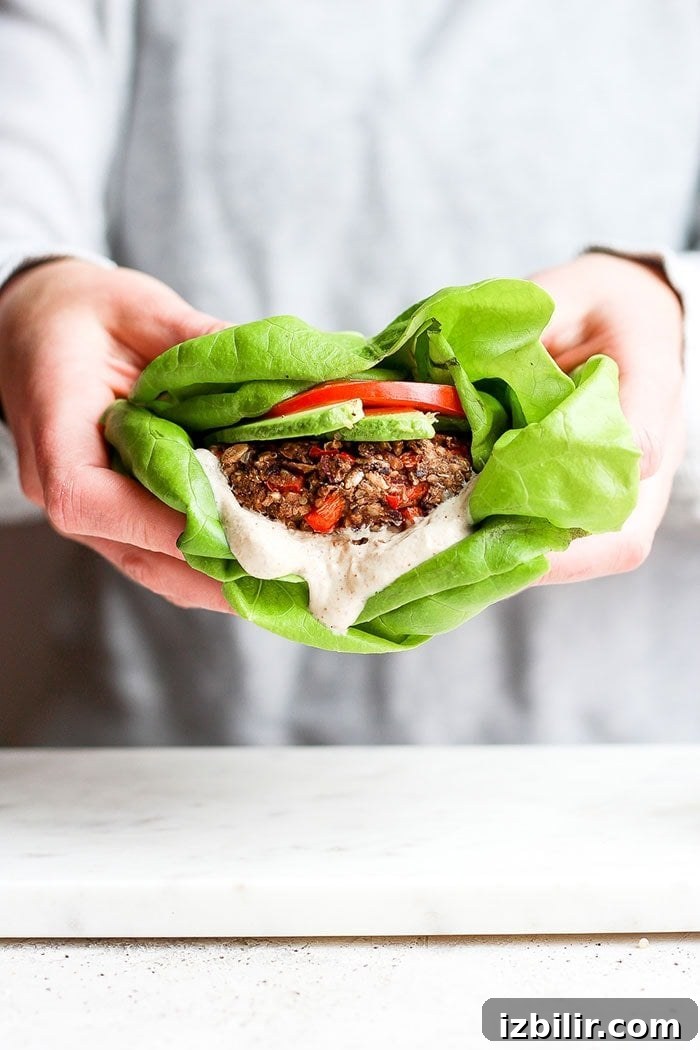 Black bean burger wrapped in butter lettuce A black bean burger in butter lettuce