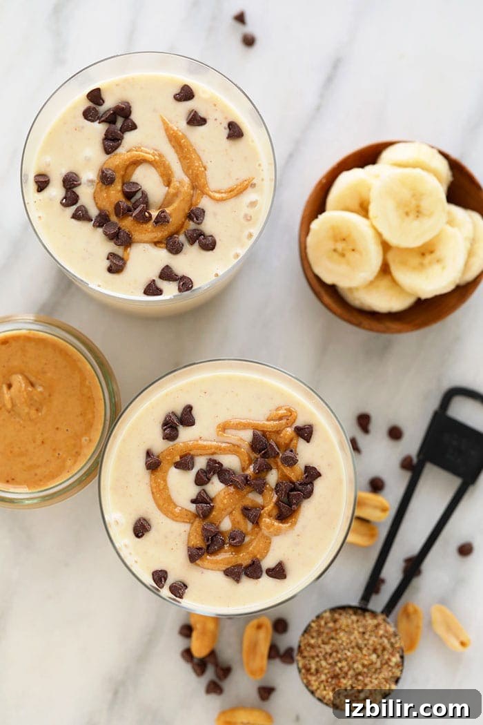Peanut butter and banana is a fan favorite when it comes to flavor combos. That's why this peanut butter banana smoothie is a show-stopping smoothie recipe you need to make! We kept this peanut butter and banana smoothie recipe simple with just 6 total ingredients! Keep reading to get the recipe and dig in! PB Banana Smoothie in glass.