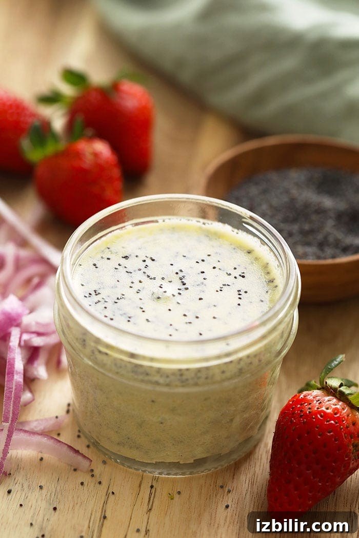 Looking for a healthy homemade salad dressing to make? Try our poppyseed dressing recipe. Poppyseed dressing in a jar.