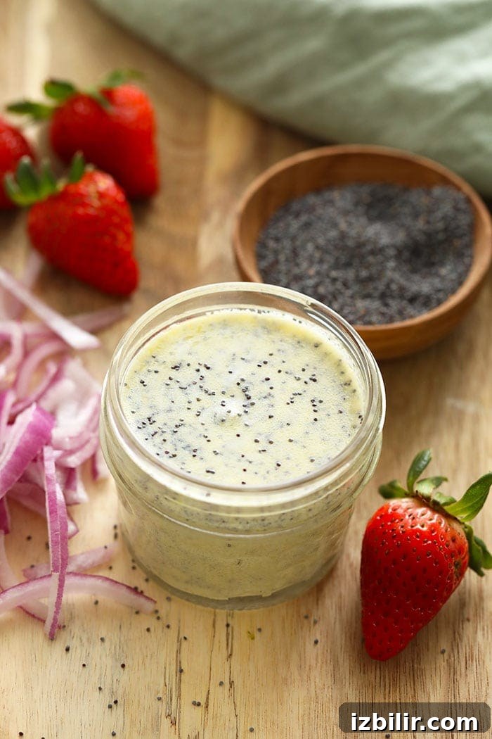 Homemade Creamy Poppy Seed Salad Dressing 4 Poppy seed dressing in a small jar.