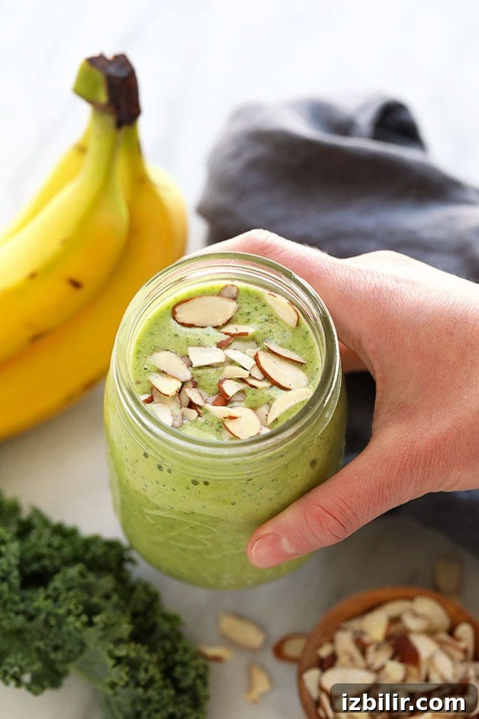 Kale smoothie topped with slivered almonds kale smoothie topped with slivered almonds