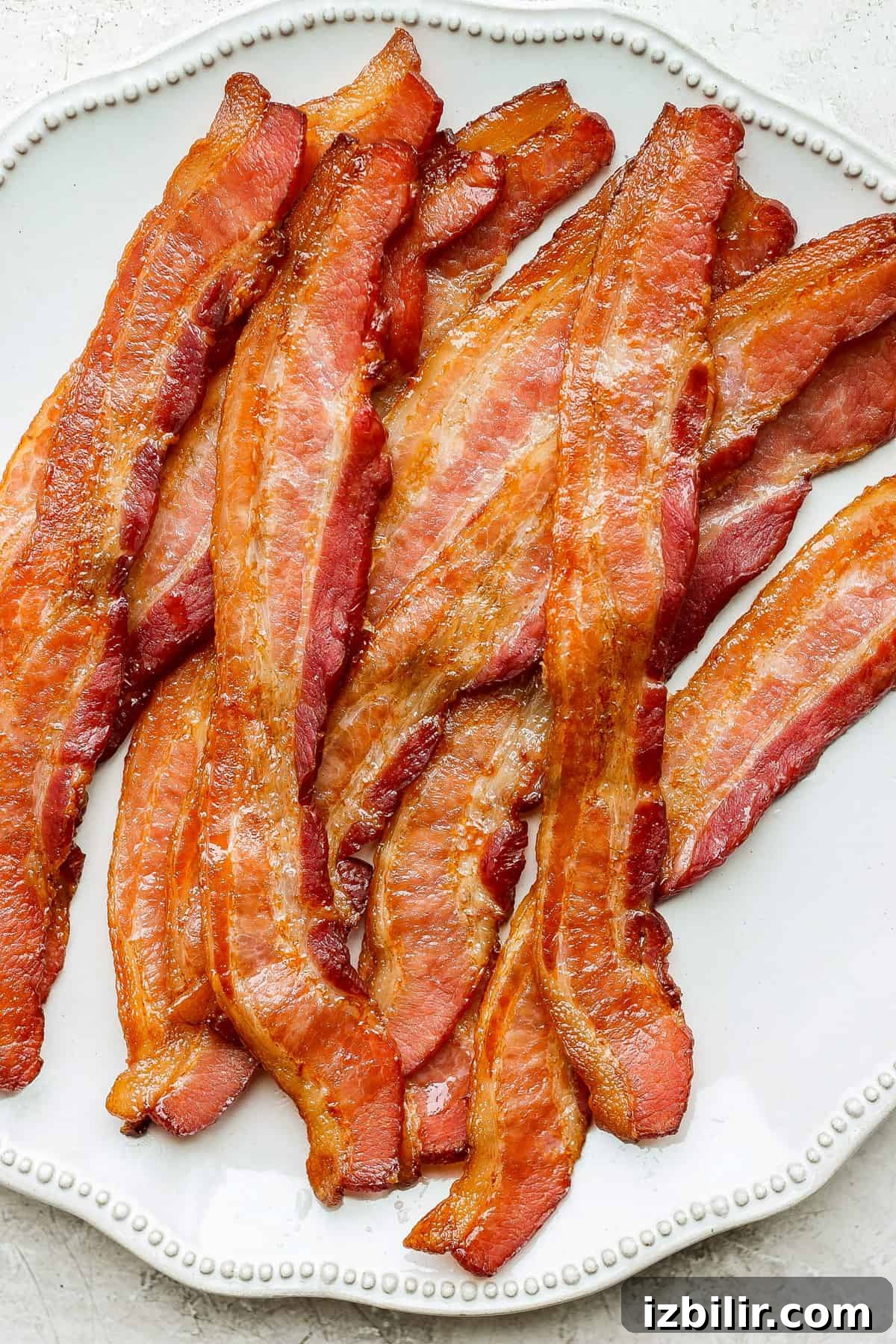 bacon on a plate on a table.