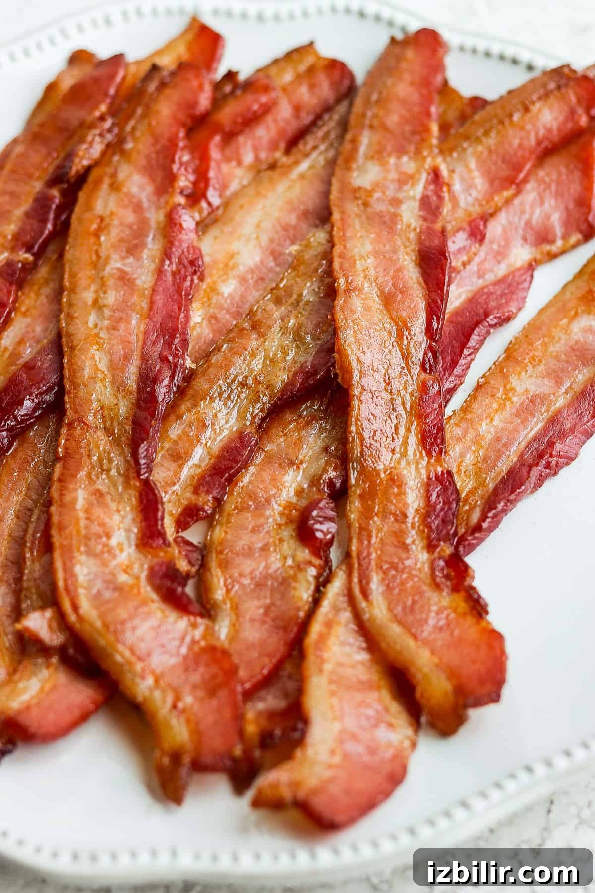 bacon on a white plate.